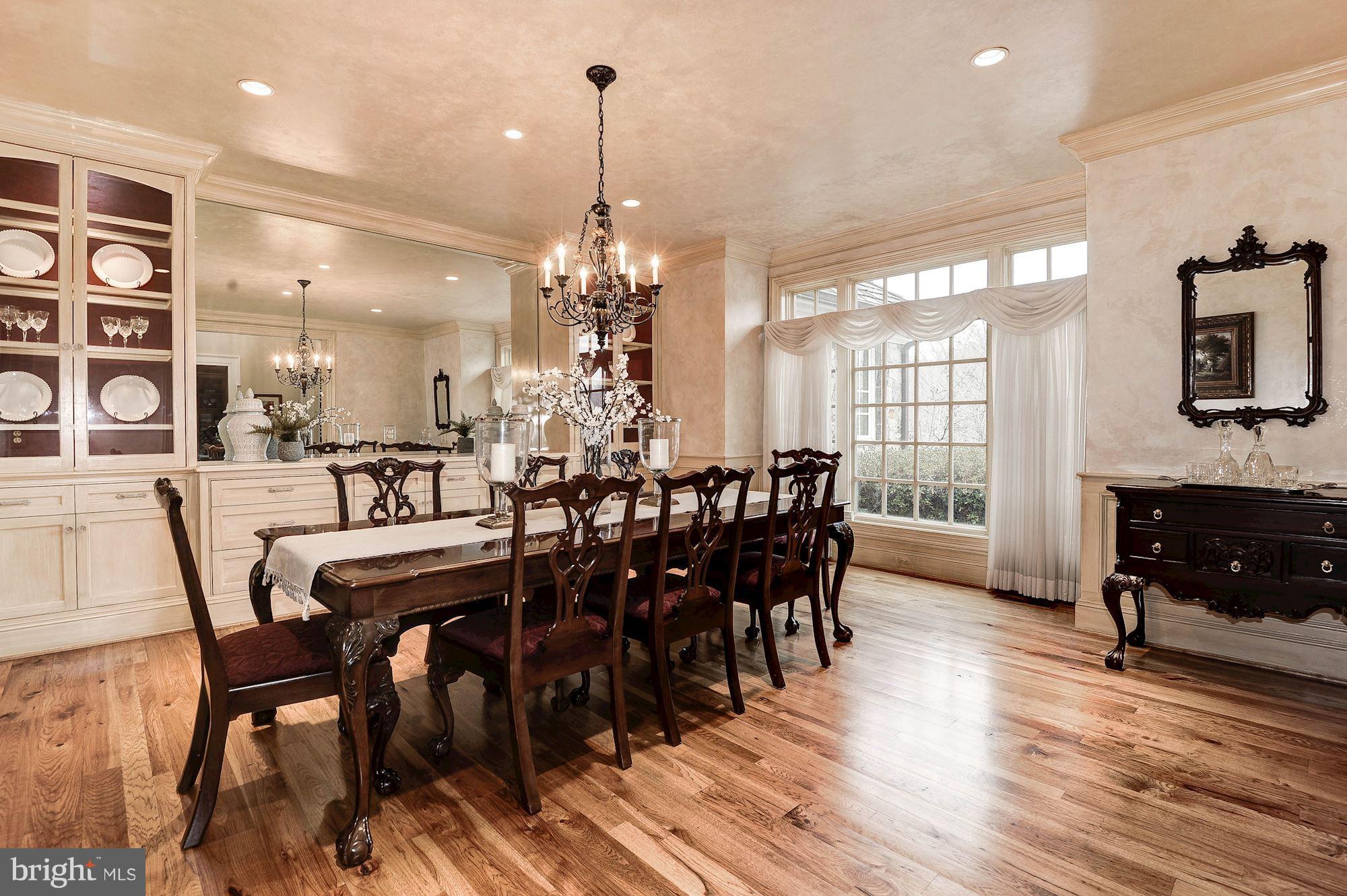 11400 Glen Road Potomac, MD 20854 - Photo 6 of 30 a view of a a dining room with furniture window and wooden floor