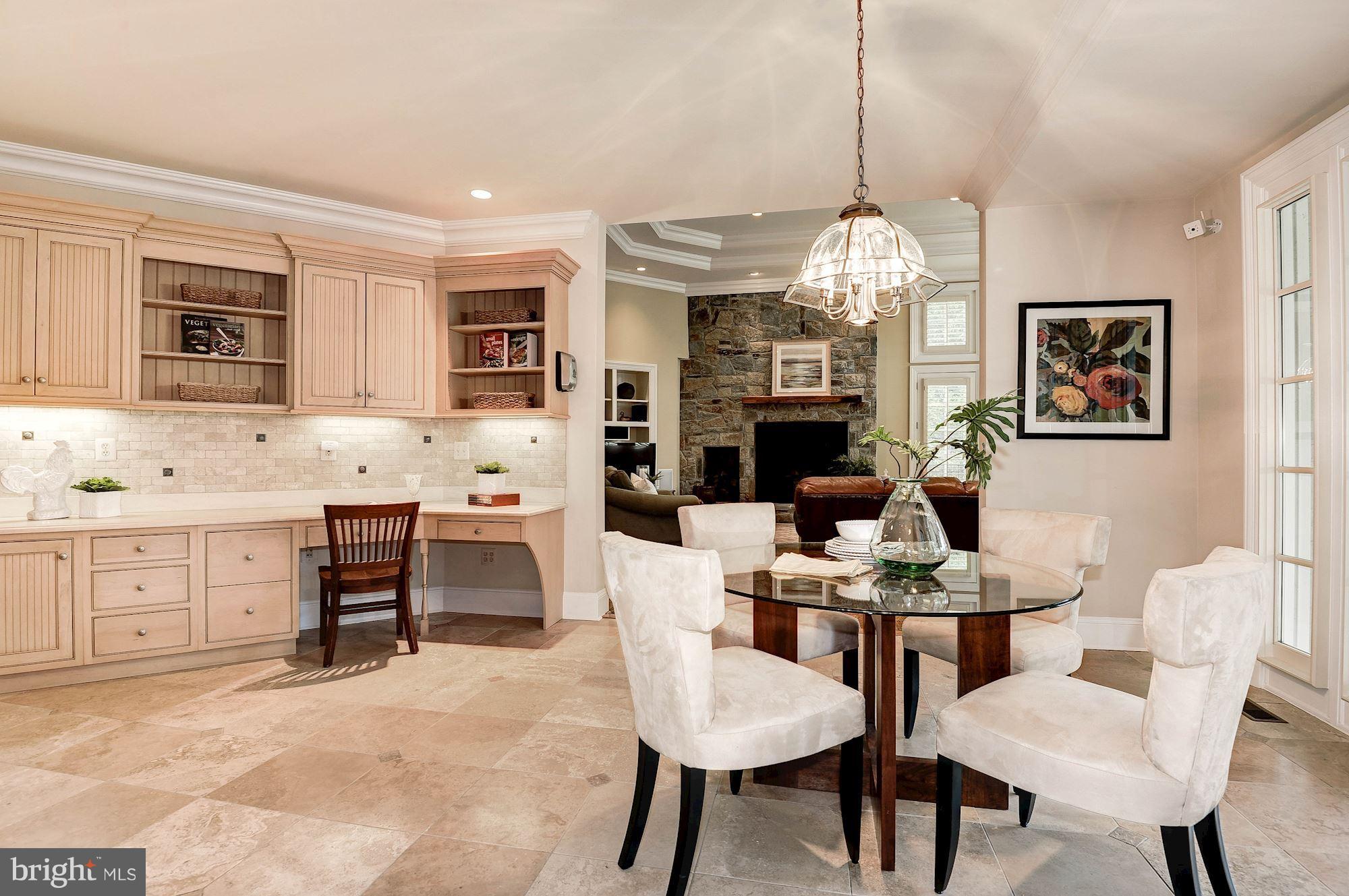 11400 Glen Road Potomac, MD 20854 - Photo 10 of 30 a dining room with furniture a chandelier and window