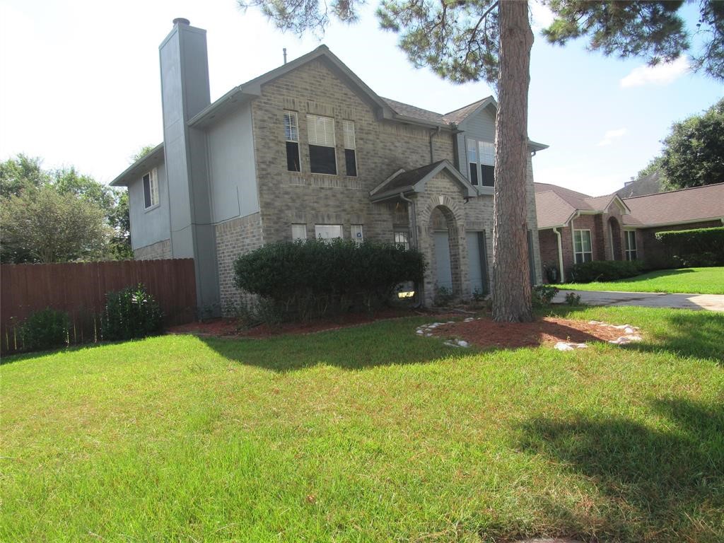 18822 Timber Way Drive Humble, TX 77346 - Photo 1 of 15 a backyard of a house