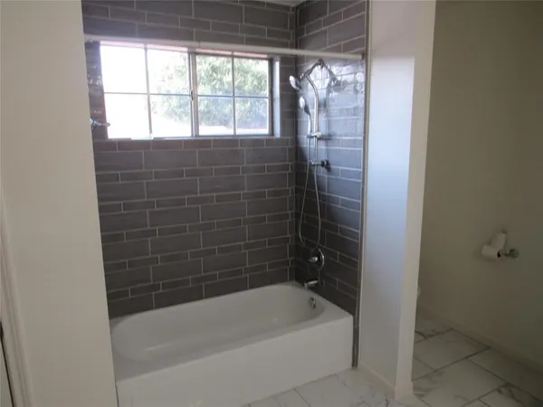 a bathroom with a bathtub