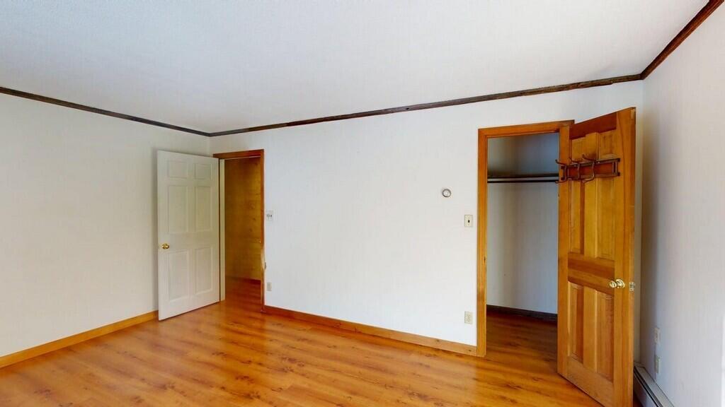 43 Heritage Street Millinocket, ME 04462 - Photo 22 of 62 22 43-Heritage-St-Primary-Bedroom 1 (Cop