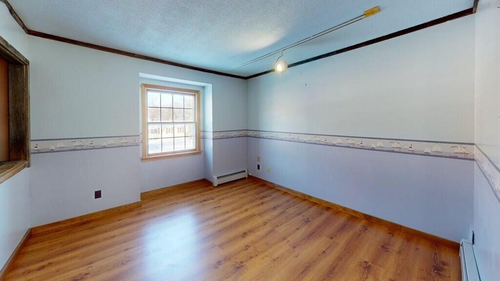 43 Heritage Street Millinocket, ME 04462 - Photo 29 of 62 28 43-Heritage-St-Bedroom-3 3 (Copy)