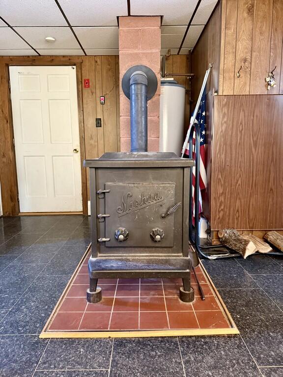 43 Heritage Street Millinocket, ME 04462 - Photo 35 of 62 35 43-Heritage-St-Wood-stove.jpg (Copy)