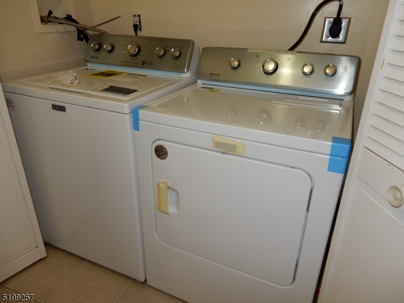 134 Main Street, Unit 3 Netcong, NJ 07857 - Photo 9 of 10 a utility room with dryer and washer
