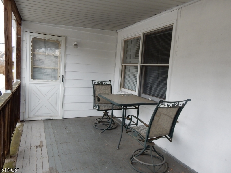 134 Main Street, Unit 3 Netcong, NJ 07857 - Photo 10 of 10 a view of a workspace with furniture and wooden floor