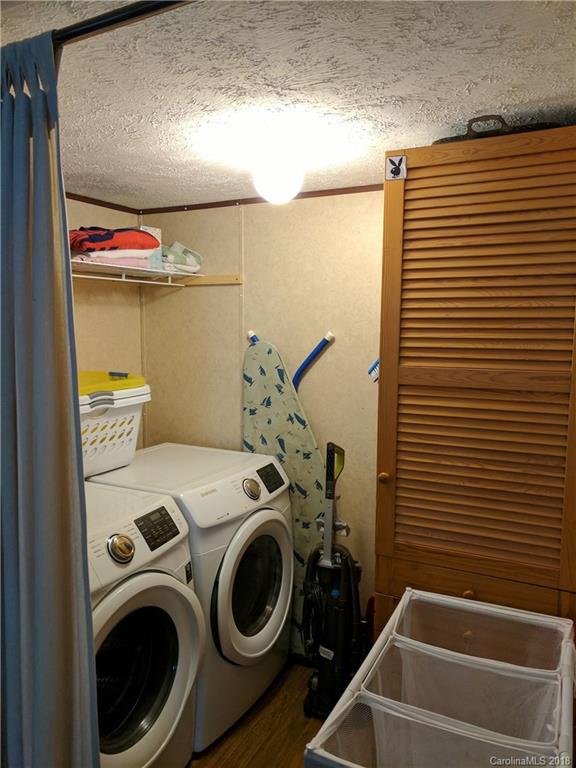 2158 Coopers Gap Road Rutherfordton, NC 28139 - Photo 14 of 27 a utility room with dryer and washer