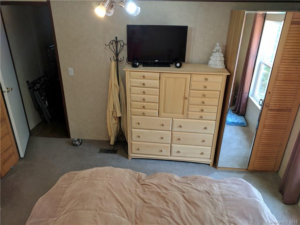 2158 Coopers Gap Road Rutherfordton, NC 28139 - Photo 16 of 27 a bedroom with a flat screen tv