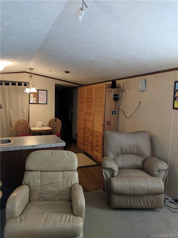 2158 Coopers Gap Road Rutherfordton, NC 28139 - Photo 10 of 27 a bedroom with furniture and a couch