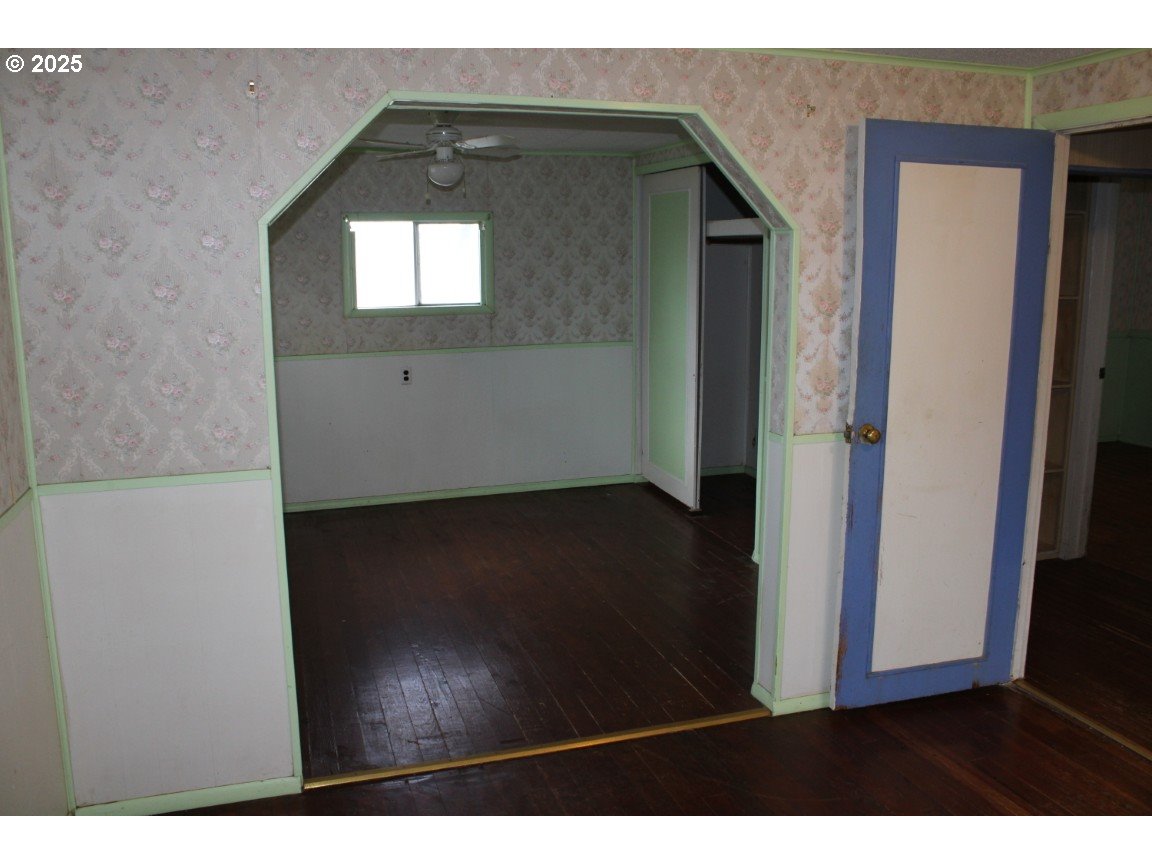360 West College Street Athena, OR 97813 - Photo 17 of 22 a view of entryway and hall with wooden floor