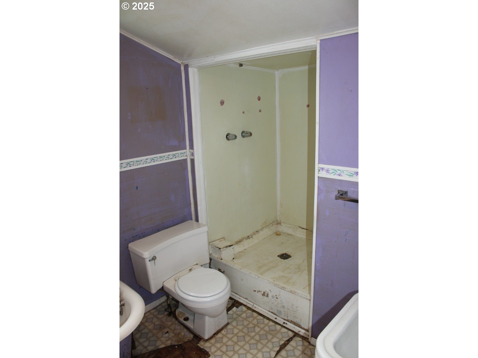 360 West College Street Athena, OR 97813 - Photo 7 of 22 a bathroom with a granite countertop toilet a sink and shower