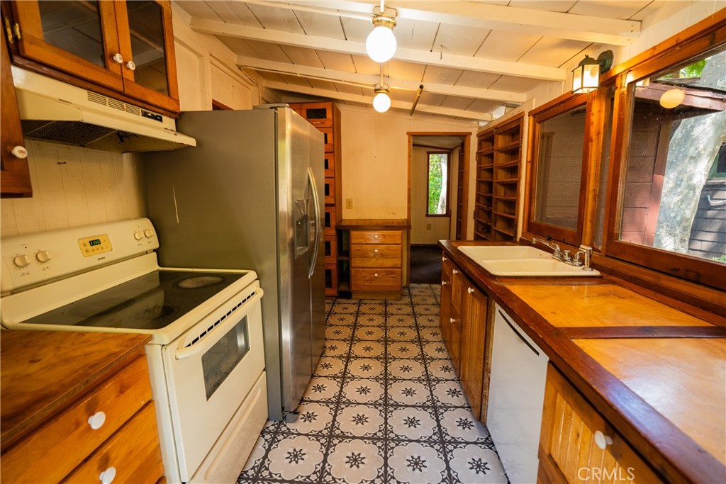 0 Hot Springs Canyon Road, Unit 26 Trabuco Canyon, CA 92679 - Photo 46 of 59 a utility room with dryer and washer