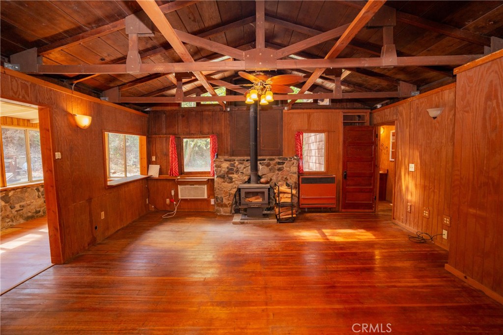 0 Hot Springs Canyon Road, Unit 26 Trabuco Canyon, CA 92679 - Photo 57 of 59 a view of a room with wooden furniture and chandelier