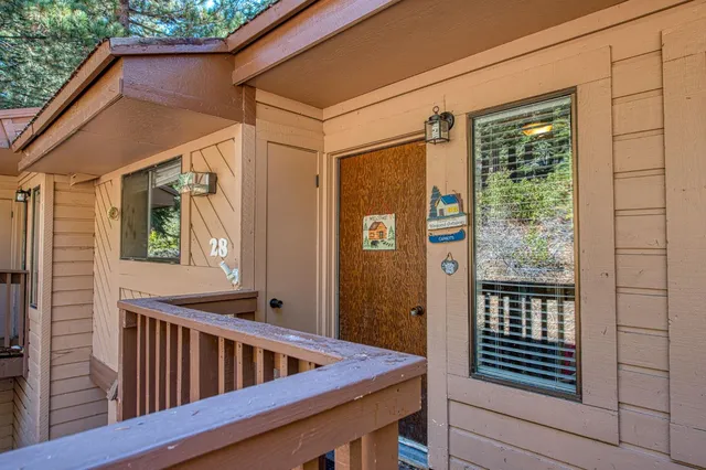 a dining room with a table and chairs