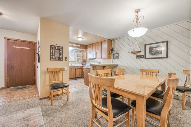 a view of a dining room with furniture