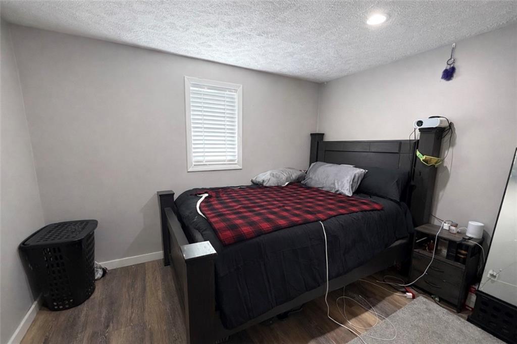 530 Branchton Road Slippery Rock, PA 16057 - Photo 7 of 11 a bedroom with a bed and a chair