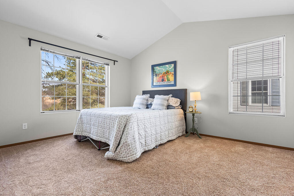 505 Lake Bluff Road, Unit C Thiensville, WI 53092 - Photo 15 of 25 Primary bedroom, nice natural light