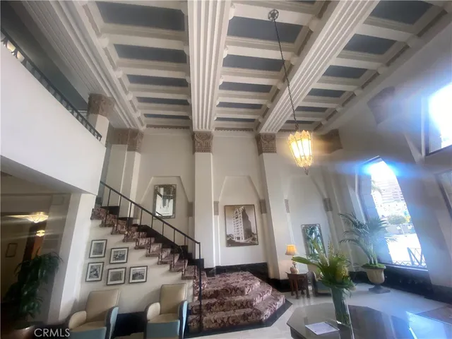 a view of living room with furniture and a window