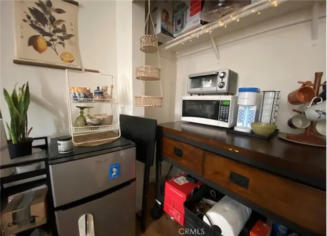 a kitchen with stainless steel appliances a sink and a stove