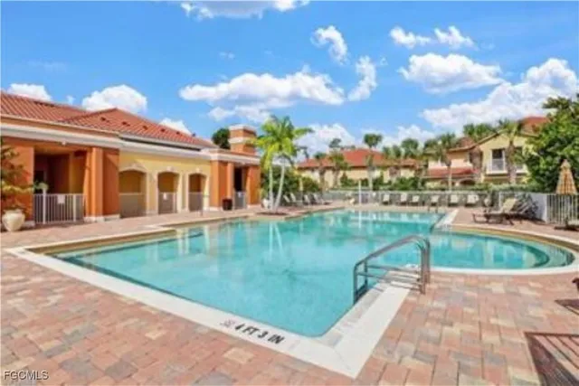 a view of a swimming pool with a fountain
