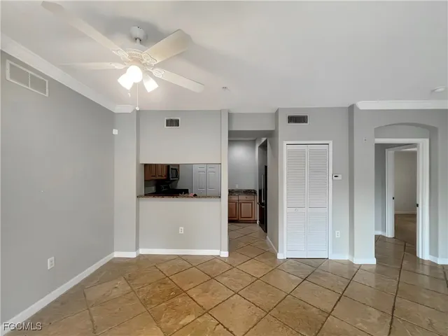 a view of a kitchen with a sink and dishwasher