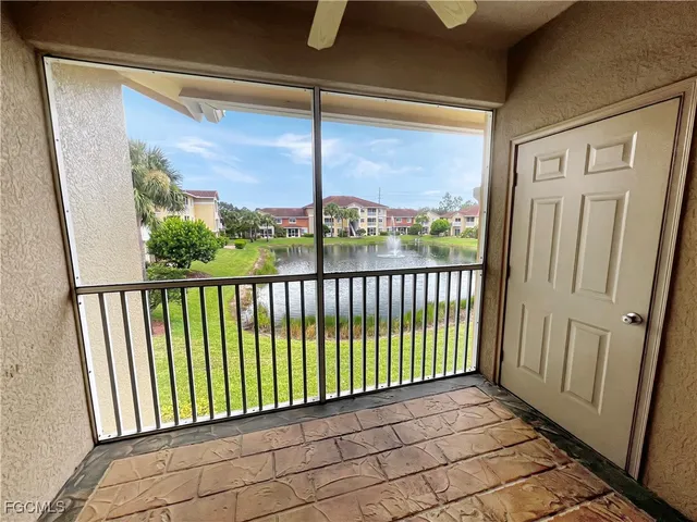 a view of a balcony with wooden floor
