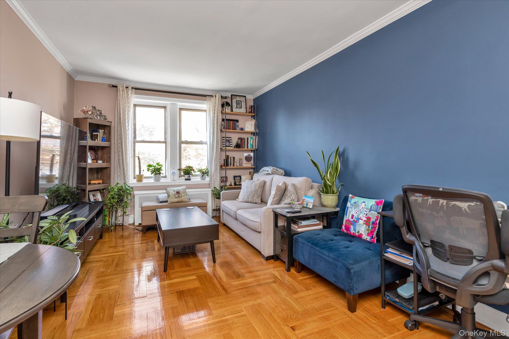 48-55 43rd Street, Unit 3F Queens, NY 11377 - Photo 2 of 12 a living room with furniture and a window