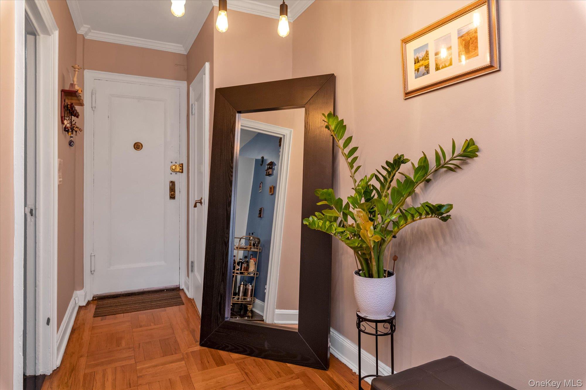 48-55 43rd Street, Unit 3F Queens, NY 11377 - Photo 5 of 12 a view of entryway with wooden floor
