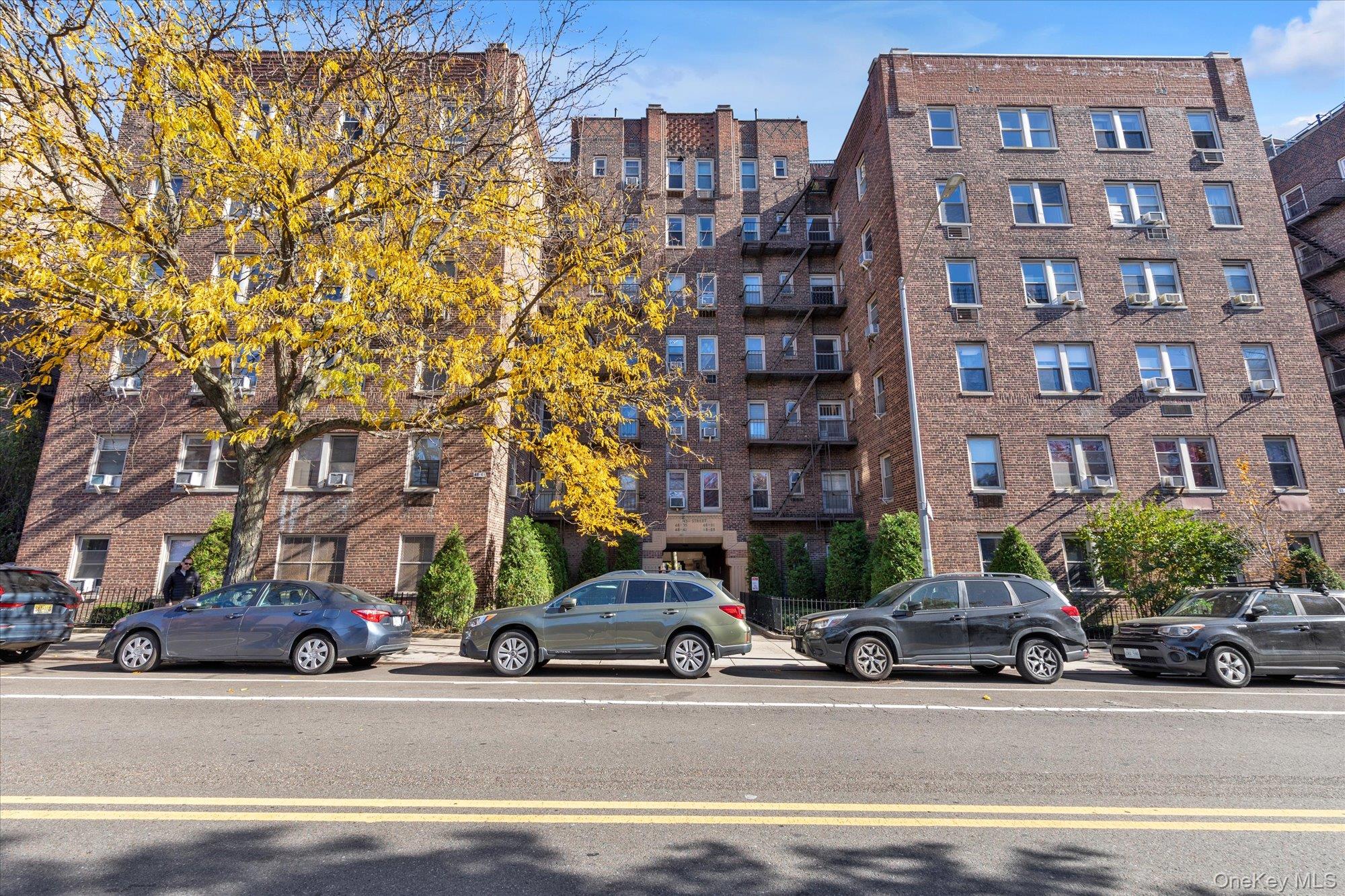 48-55 43rd Street, Unit 3F Queens, NY 11377 - Photo 10 of 12 a car parked in front of a building