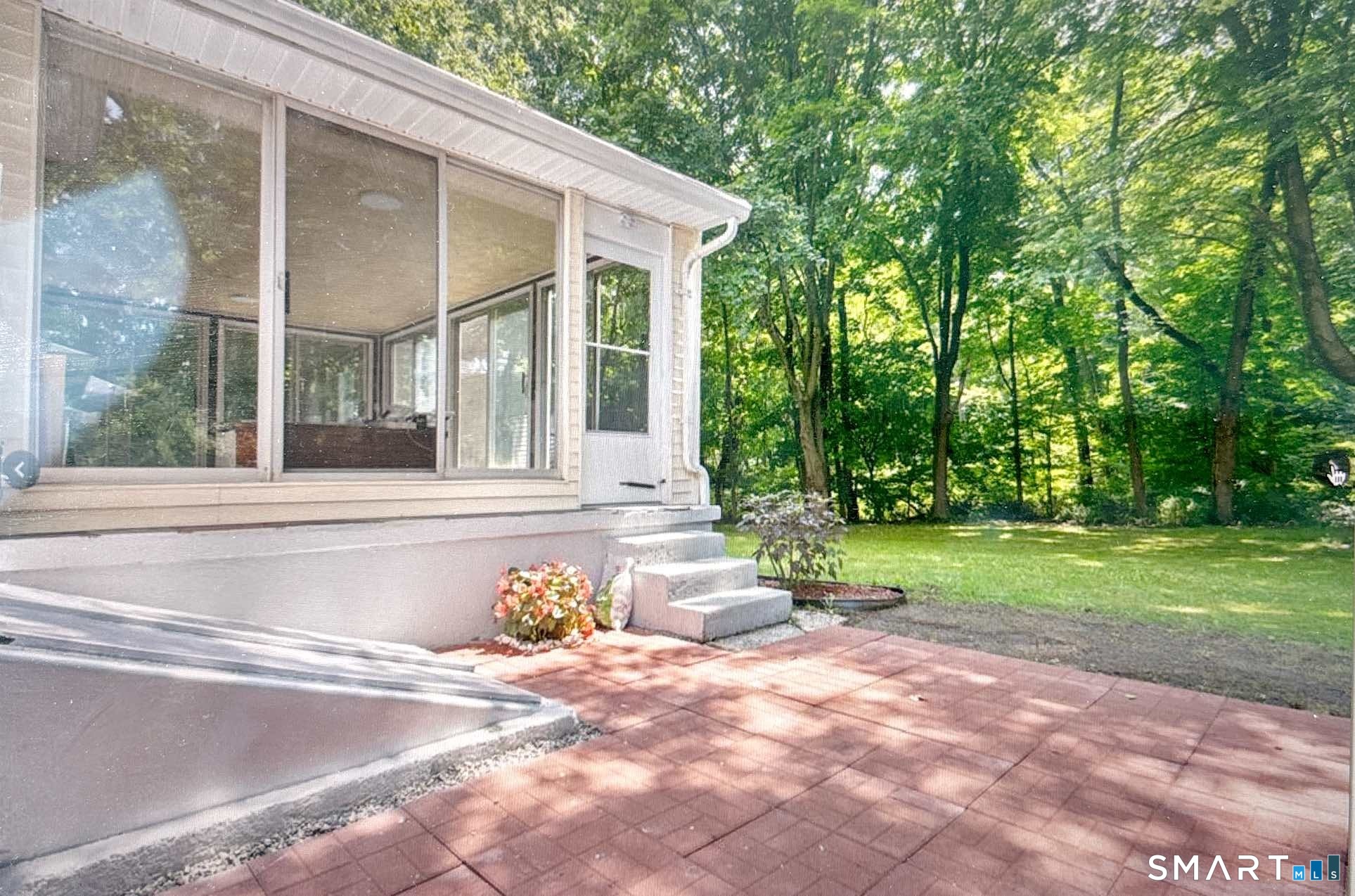303 Bunker Hill Avenue Waterbury, CT 06708 - Photo 5 of 5 a front view of a house with garden