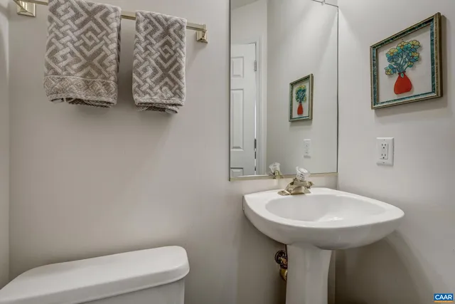 a bathroom with a toilet and sink