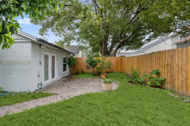 a view of backyard with green space