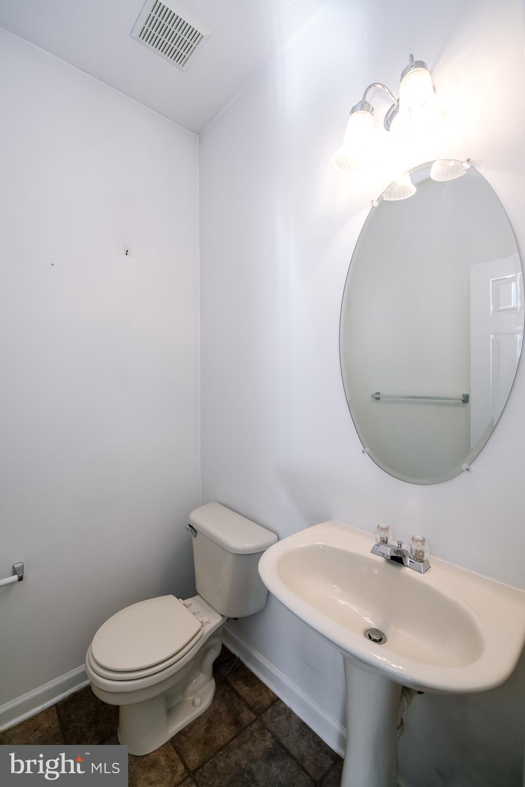 5029 Leasdale Road Baltimore, MD 21237 - Photo 10 of 26 Main floor powder room