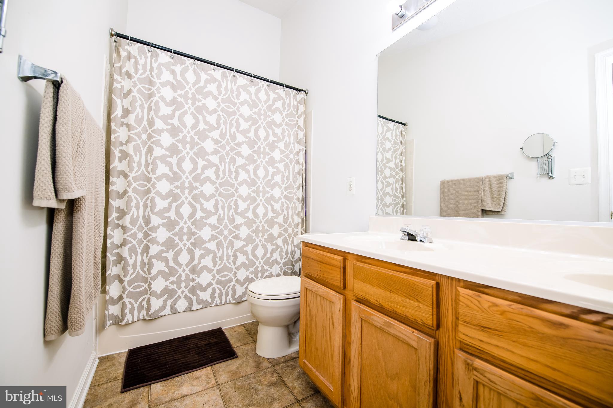 5029 Leasdale Road Baltimore, MD 21237 - Photo 15 of 26 Dual vanity in master bathroom