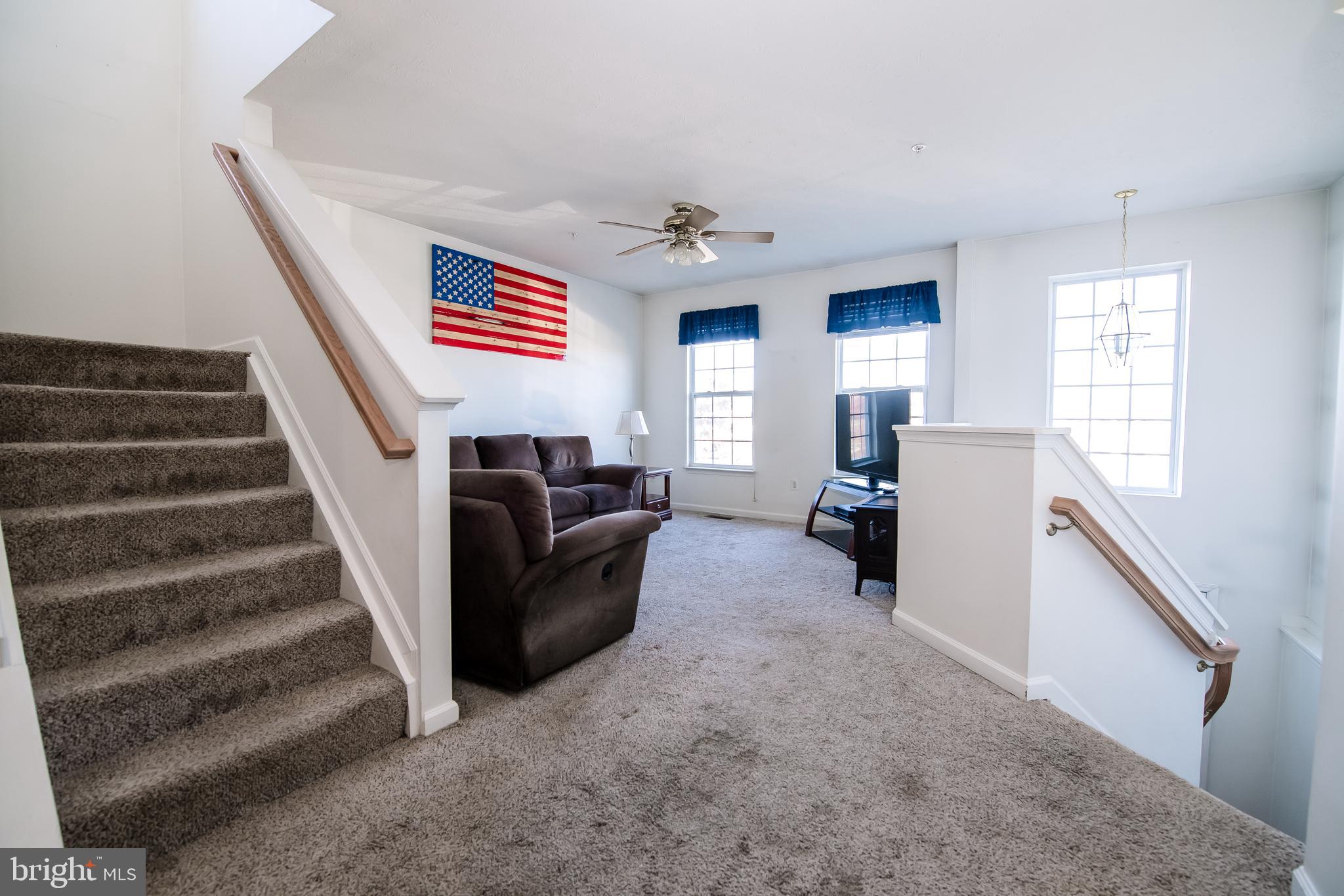 5029 Leasdale Road Baltimore, MD 21237 - Photo 3 of 26 High ceiling foyer takes you to living and dining