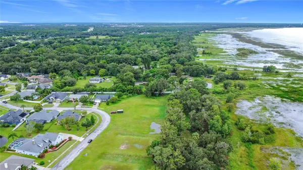 a view of a yard with an outdoor space