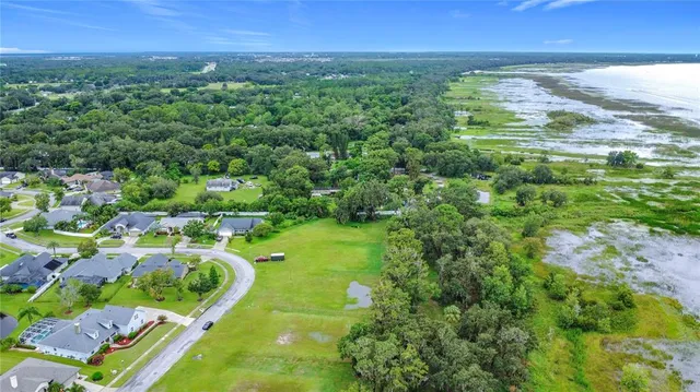 a view of a yard with an outdoor space