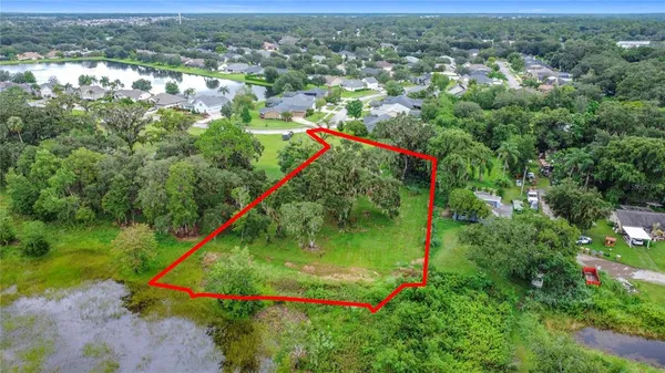 a view of a lake with a city