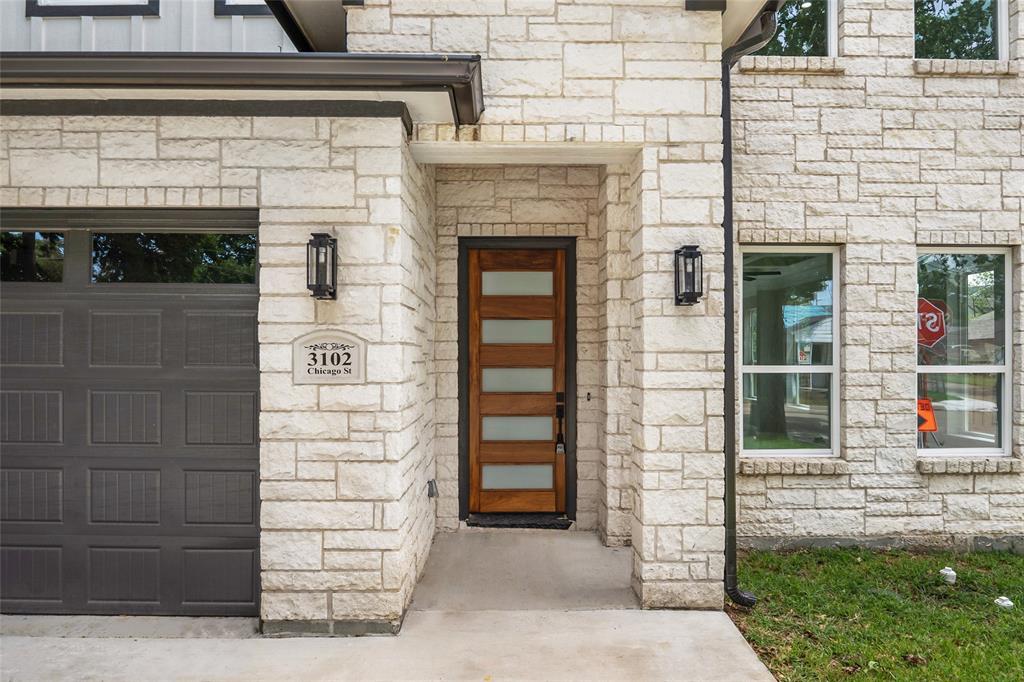 3102 Chicago Street Dallas, TX 75212 - Photo 20 of 20 a front view of a house with garage