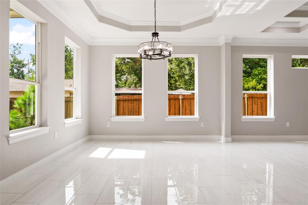 3102 Chicago Street Dallas, TX 75212 - Photo 3 of 20 a view of an empty room with windows