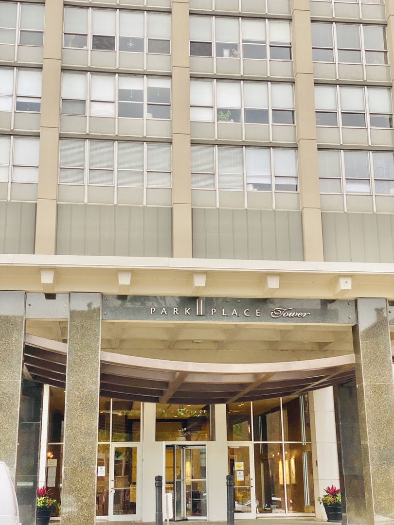 655 West Irving Park Road, Unit 2112 Chicago, IL 60613 - Photo 2 of 49 a front view of a building with a window