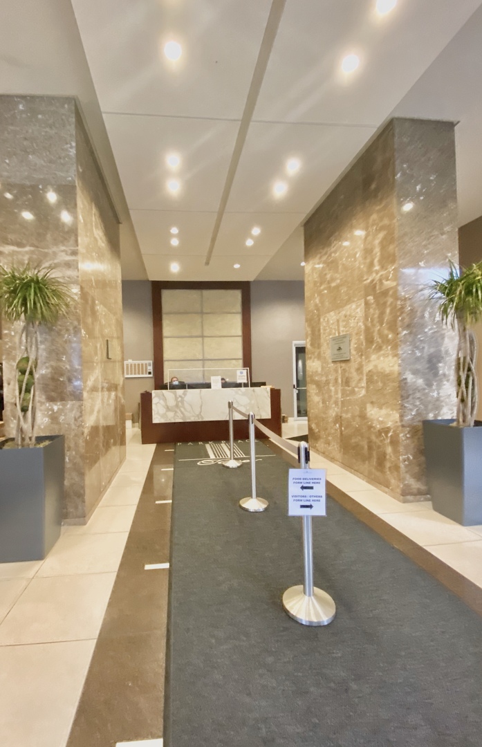 655 West Irving Park Road, Unit 2112 Chicago, IL 60613 - Photo 25 of 49 a lobby with gym equipment