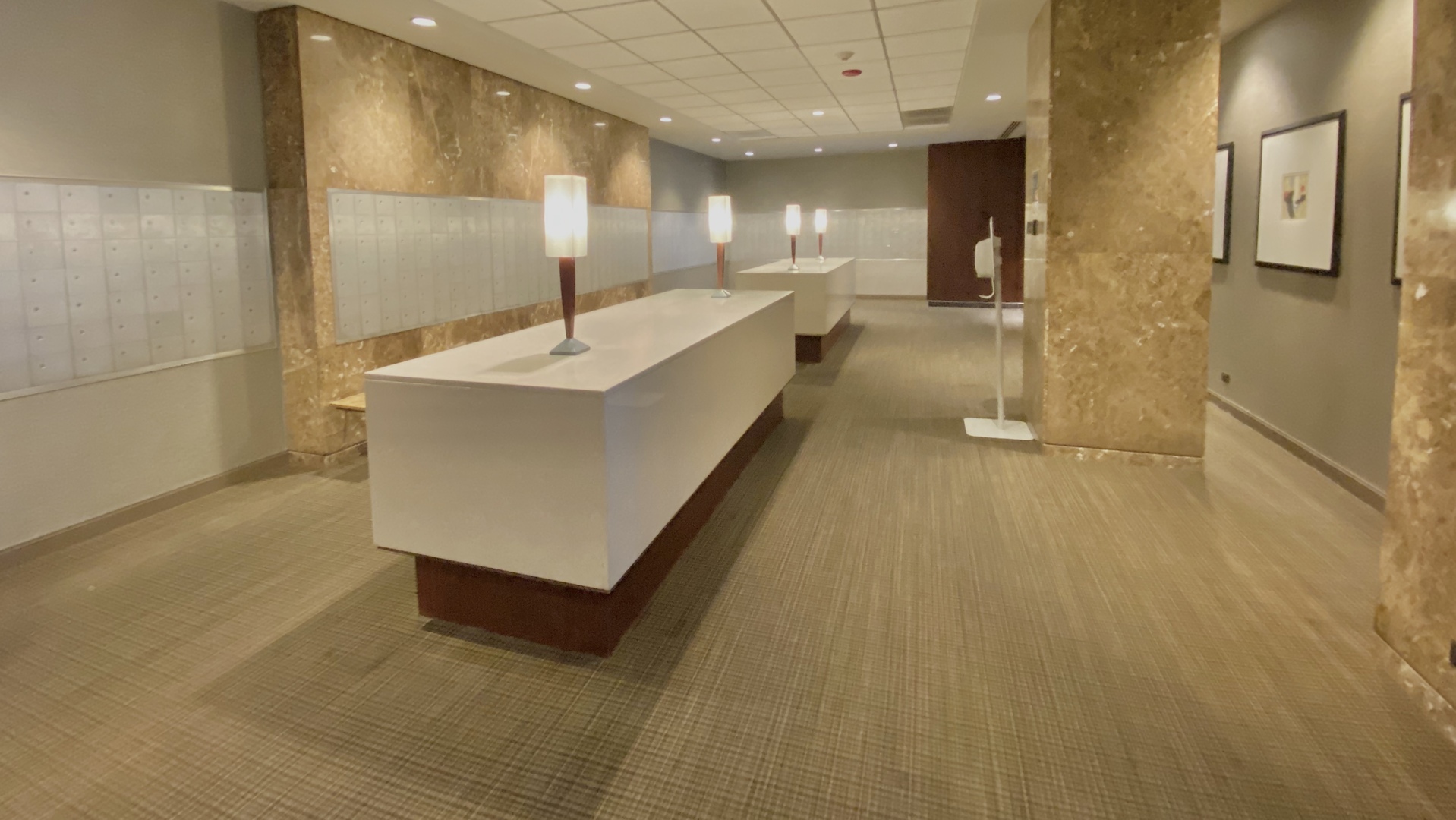 655 West Irving Park Road, Unit 2112 Chicago, IL 60613 - Photo 31 of 49 a large room with a large mirror