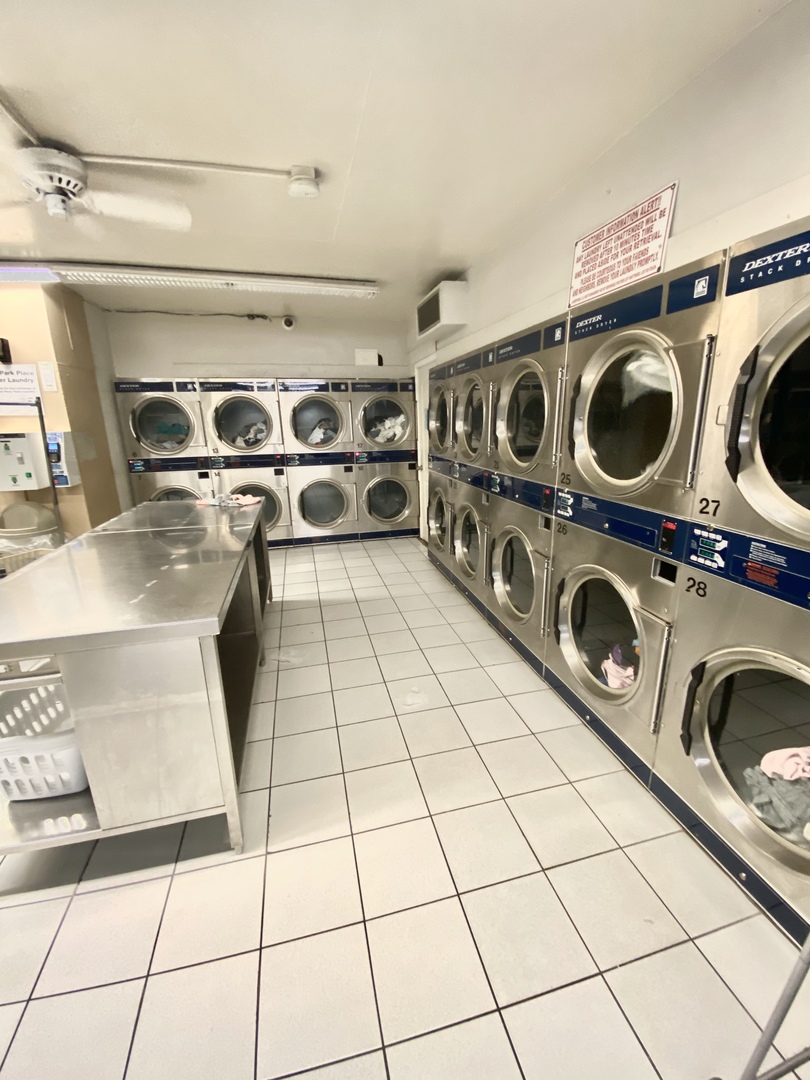 655 West Irving Park Road, Unit 2112 Chicago, IL 60613 - Photo 34 of 49 a utility room with dryer and washer