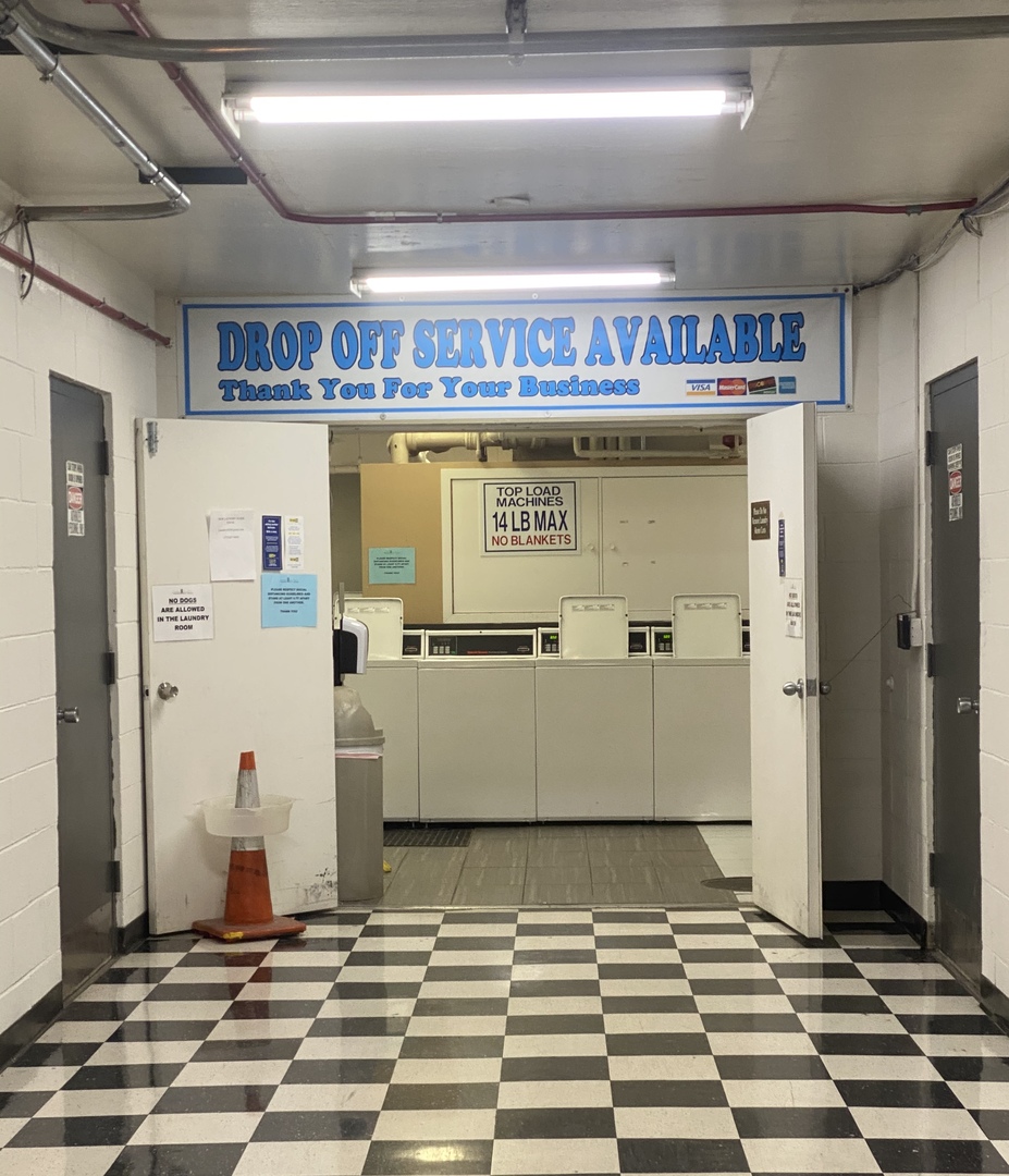 655 West Irving Park Road, Unit 2112 Chicago, IL 60613 - Photo 35 of 49 a view of a room with wooden floor