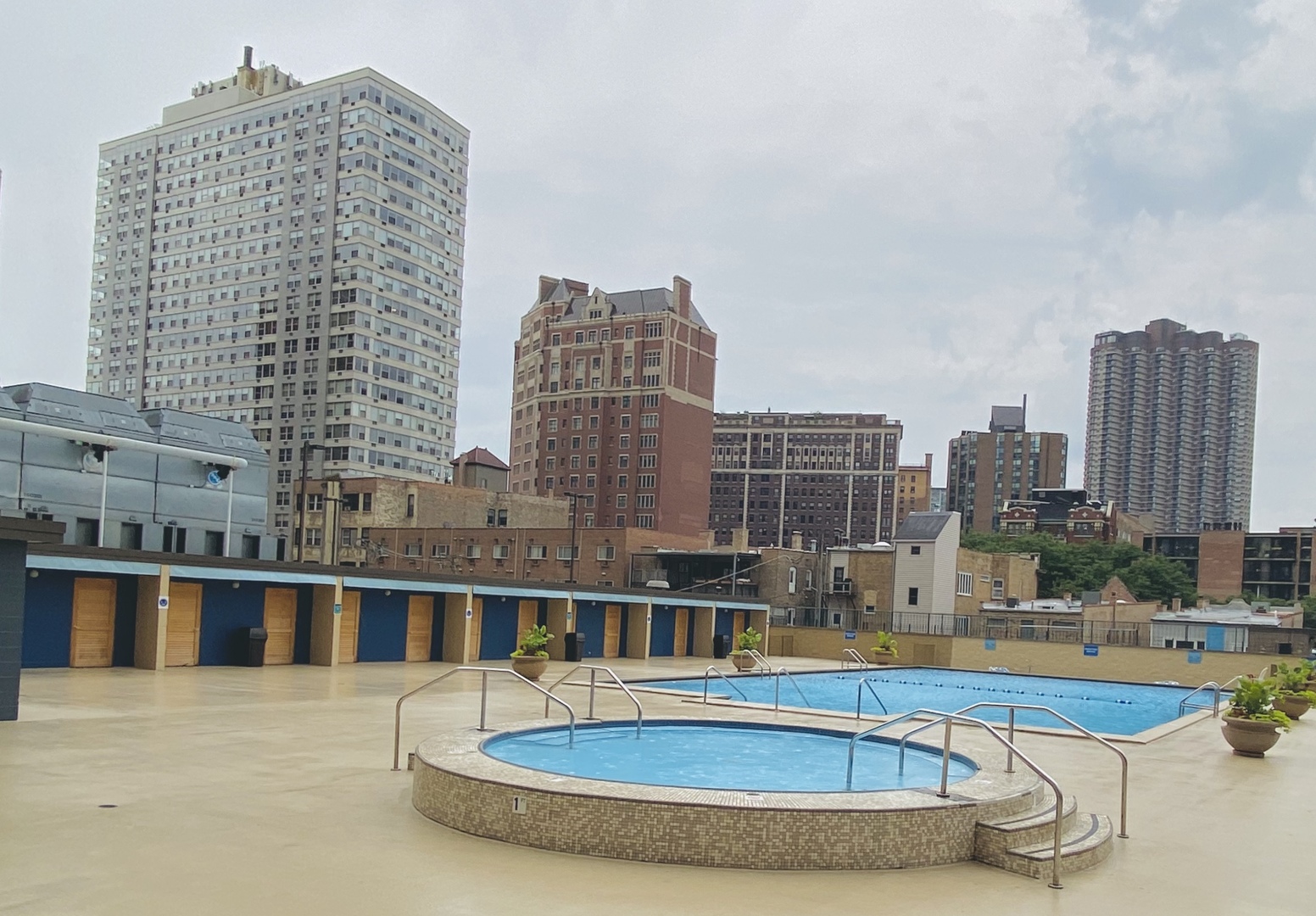 655 West Irving Park Road, Unit 2112 Chicago, IL 60613 - Photo 44 of 49 a view of buildings with a swimming pool