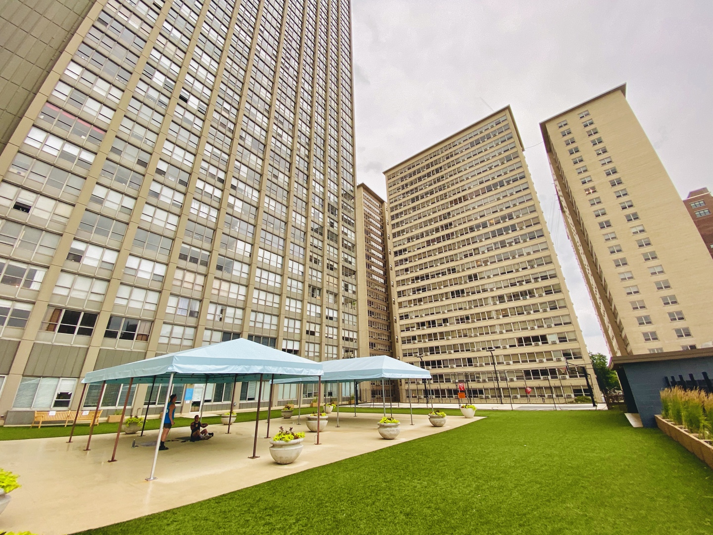 655 West Irving Park Road, Unit 2112 Chicago, IL 60613 - Photo 45 of 49 a view of pool with outdoor seating