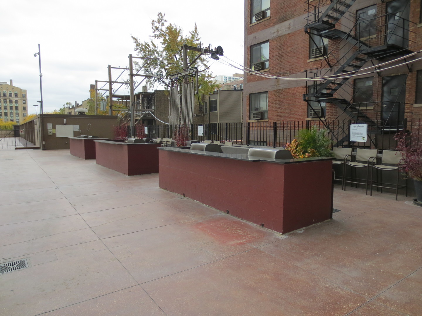 655 West Irving Park Road, Unit 2112 Chicago, IL 60613 - Photo 48 of 49 a view of a house with outdoor kitchen