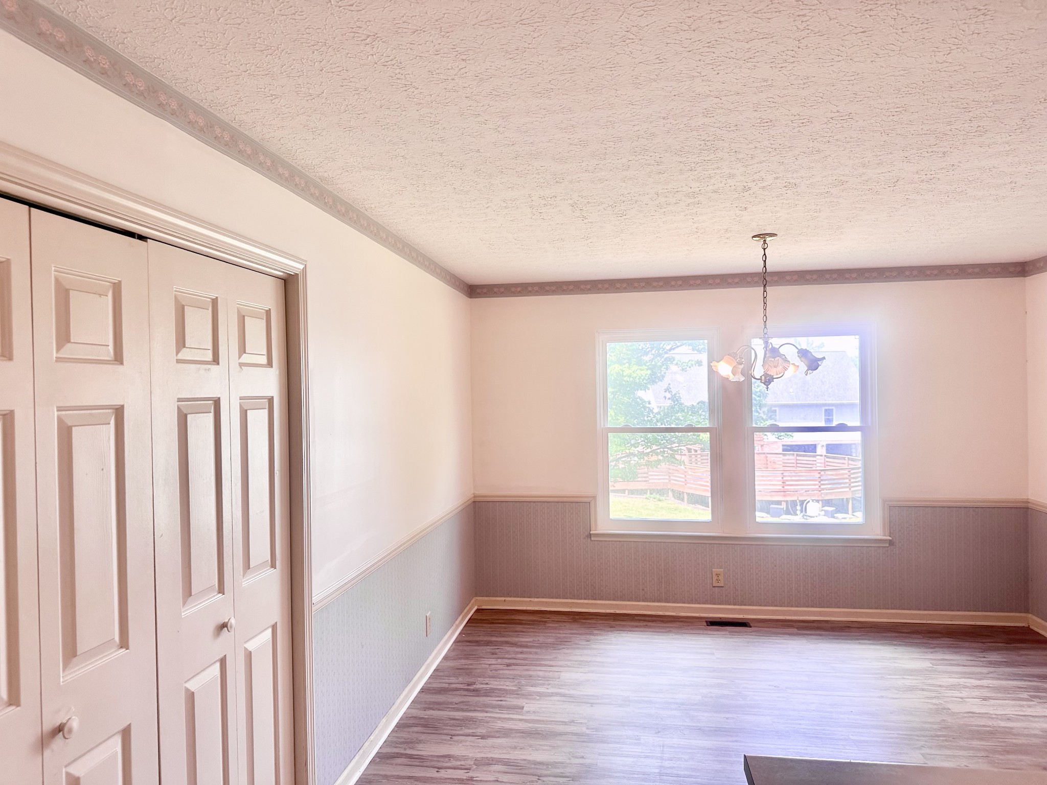 141 South Palmers Chapel Road White House, TN 37188 - Photo 11 of 33 a view of an empty room with wooden floor and a window