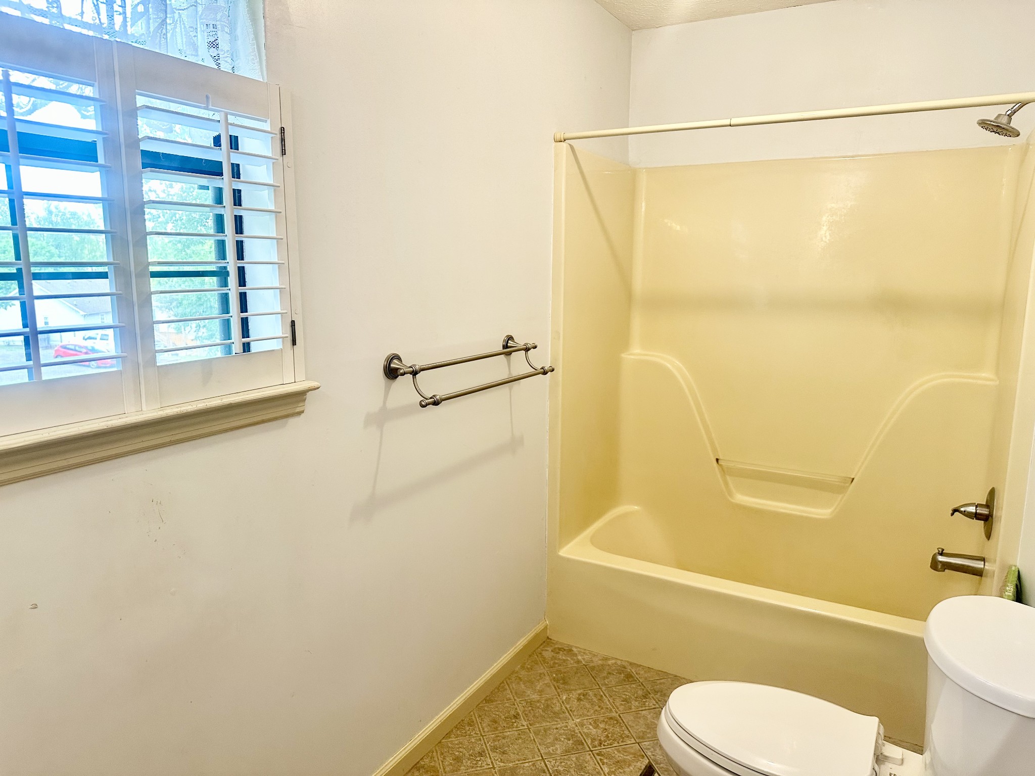 141 South Palmers Chapel Road White House, TN 37188 - Photo 26 of 33 a white toilet sitting next to a bath tub