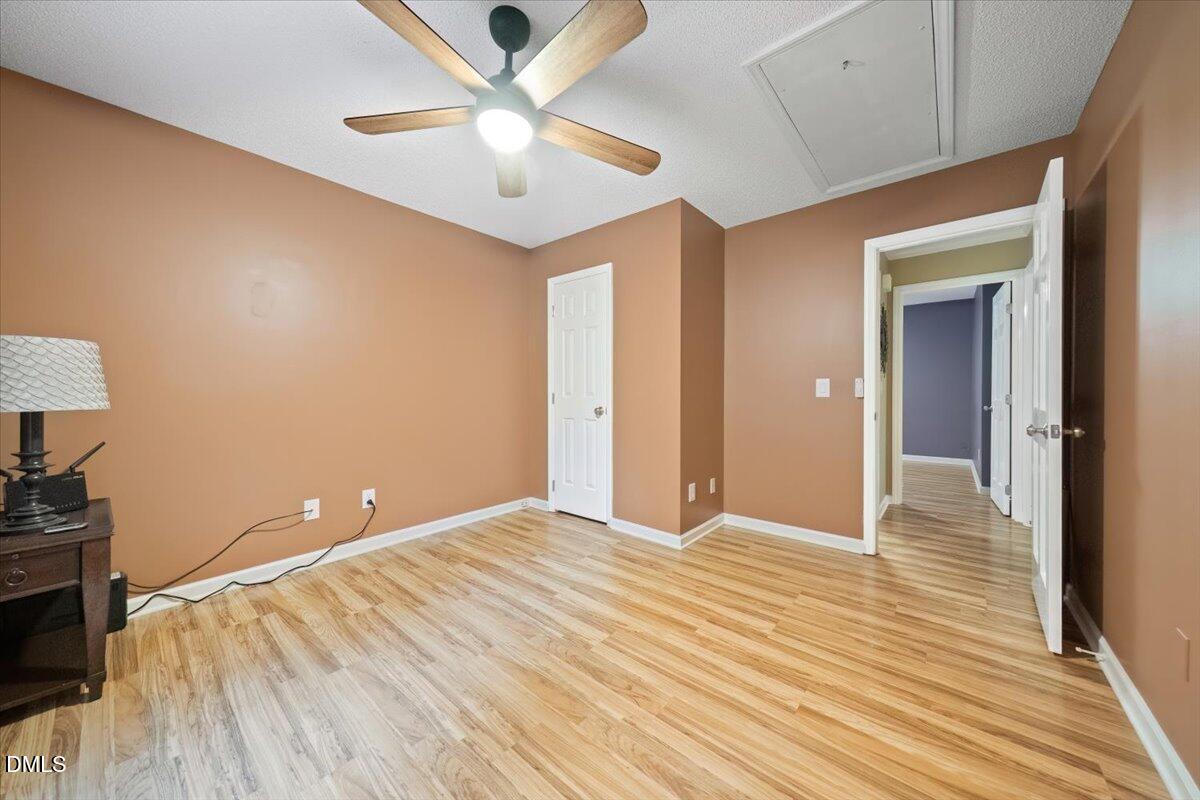 5216 Relay Way Raleigh, NC 27603 - Photo 13 of 27 wooden floor in an empty room with a window